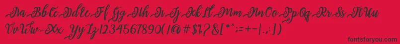 issabeta Script-Schriftart – Schwarze Schriften auf rotem Hintergrund