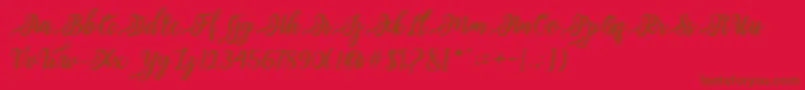 Шрифт issabeta Script – коричневые шрифты на красном фоне