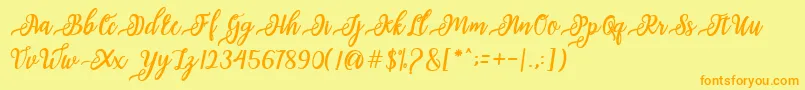 Fonte issabeta Script – fontes laranjas em um fundo amarelo