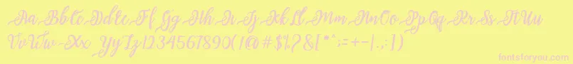 issabeta Script-Schriftart – Rosa Schriften auf gelbem Hintergrund