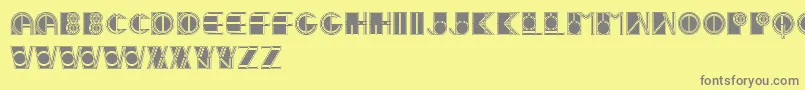 IvanLinearFilled-fontti – harmaat kirjasimet keltaisella taustalla
