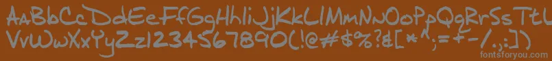 フォントj d – 茶色の背景に灰色の文字