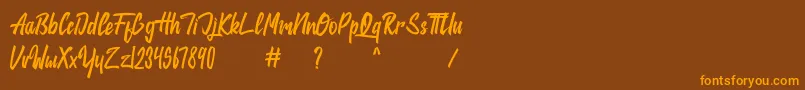 jackie Font – Orange Fonts on Brown Background