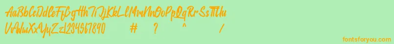 jackie Font – Orange Fonts on Green Background
