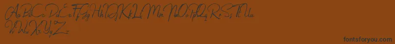Jacklyne Font – Black Fonts on Brown Background