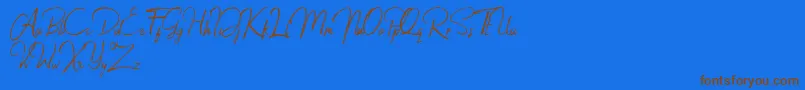 Jacklyne Font – Brown Fonts on Blue Background