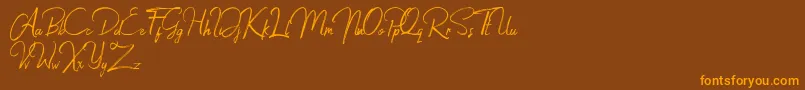Jacklyne Font – Orange Fonts on Brown Background