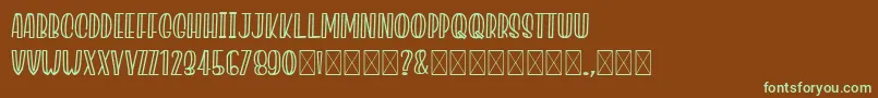 フォントJacklynMilner – 緑色の文字が茶色の背景にあります。