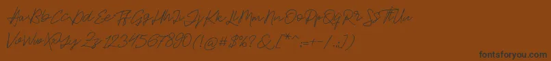 Jackson Script Font – Black Fonts on Brown Background