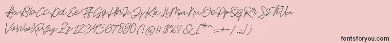 フォントJackson Script – ピンクの背景に黒い文字