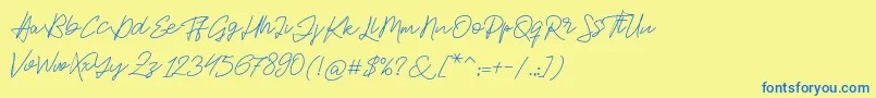フォントJackson Script – 青い文字が黄色の背景にあります。