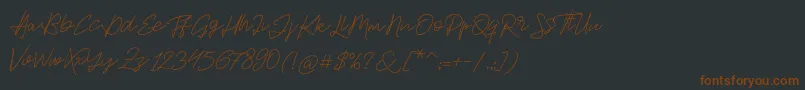 Jackson Script-fontti – ruskeat fontit mustalla taustalla