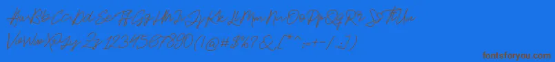 Jackson Script-Schriftart – Braune Schriften auf blauem Hintergrund