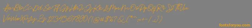 Шрифт Jackson Script – оранжевые шрифты на сером фоне