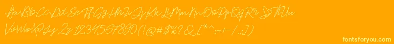 フォントJackson Script – オレンジの背景に黄色の文字