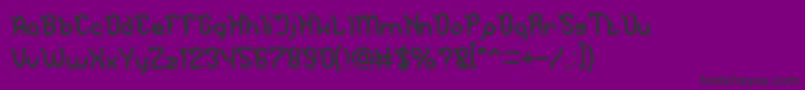 JAGUAR-Schriftart – Schwarze Schriften auf violettem Hintergrund