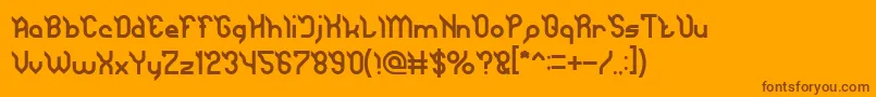 JAGUAR-Schriftart – Braune Schriften auf orangefarbenem Hintergrund