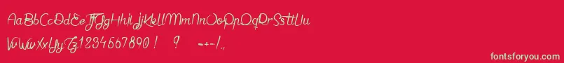Jaime bien le Dimanche -Schriftart – Grüne Schriften auf rotem Hintergrund