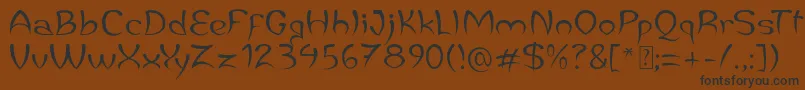 フォントJaleasDemo – 黒い文字が茶色の背景にあります