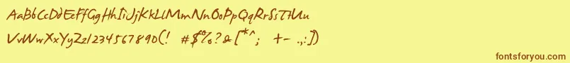 フォントJames Fajardo – 茶色の文字が黄色の背景にあります。