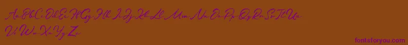 Jamilah-Schriftart – Violette Schriften auf braunem Hintergrund