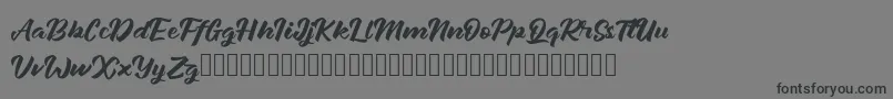 Janetalus Font – Black Fonts on Gray Background