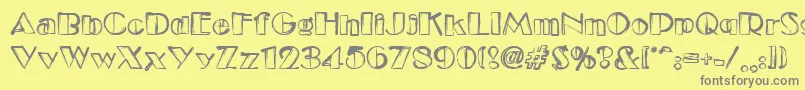 フォントEtude – 黄色の背景に灰色の文字