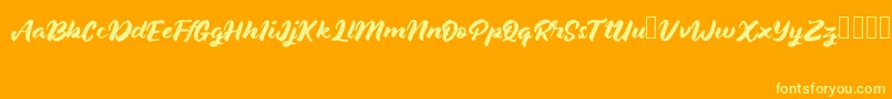 JanethJohn Font – Yellow Fonts on Orange Background