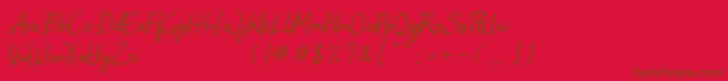 フォントJanille Free Personal Use – 赤い背景に茶色の文字