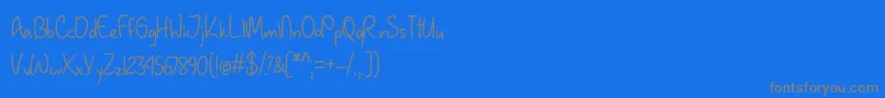 January Handwriting   Font – Gray Fonts on Blue Background