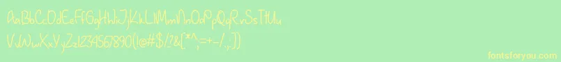 January Handwriting   Font – Yellow Fonts on Green Background