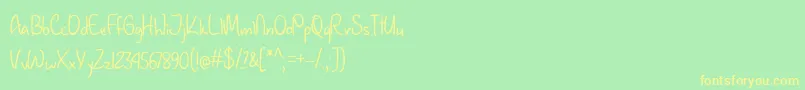 January Handwriting   Font – Yellow Fonts on Green Background