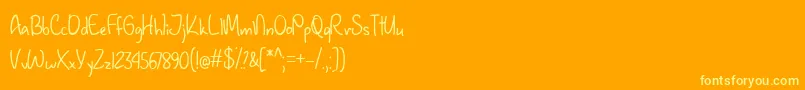 January Handwriting  -Schriftart – Gelbe Schriften auf orangefarbenem Hintergrund