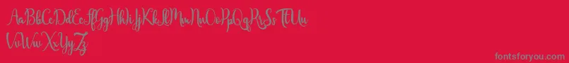 Weitere Informationen zur Javinka Script-Schriftart Javinka Script-Schriftart – Graue Schriften auf rotem Hintergrund