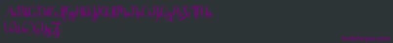 Czcionka Javinka Script – fioletowe czcionki na czarnym tle