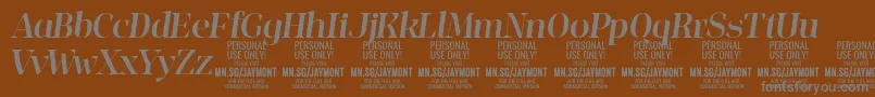 JaymontMei PERSONAL USE-fontti – harmaat kirjasimet ruskealla taustalla