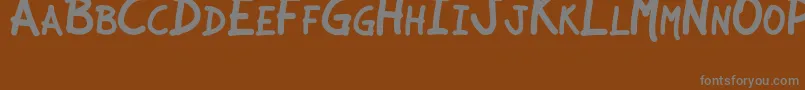 フォントJCAguirreP   Libre – 茶色の背景に灰色の文字