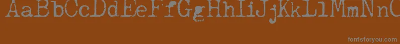 JCAguirrep   Old Type Font – Gray Fonts on Brown Background