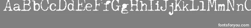 JCAguirrep   Old Type-Schriftart – Weiße Schriften auf grauem Hintergrund