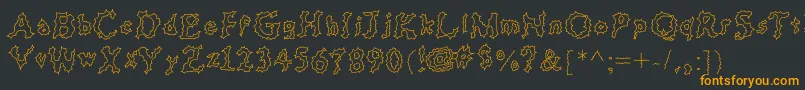 フォントjd cereus – 黒い背景にオレンジの文字