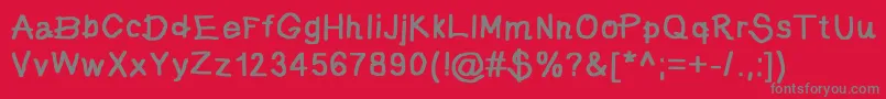 フォントjd pictura – 赤い背景に灰色の文字