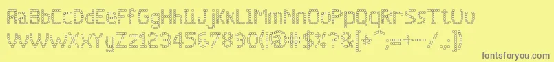 jd quadz Font – Gray Fonts on Yellow Background