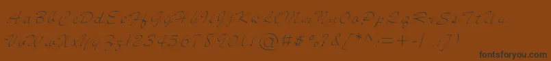 フォントjd sketched – 黒い文字が茶色の背景にあります