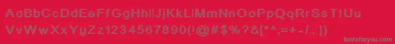 フォントjd stripex – 赤い背景に灰色の文字