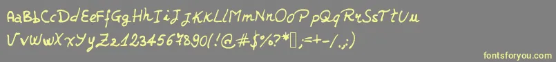 JDJerk Font – Yellow Fonts on Gray Background