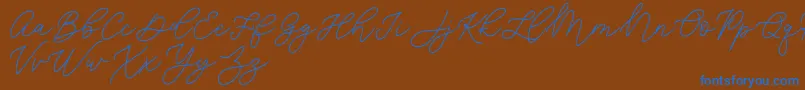 Шрифт Jean Jingga   – синие шрифты на коричневом фоне