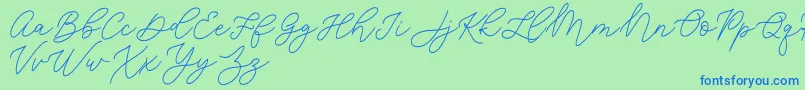 Шрифт Jean Jingga   – синие шрифты на зелёном фоне