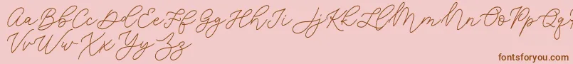 Jean Jingga  -fontti – ruskeat fontit vaaleanpunaisella taustalla