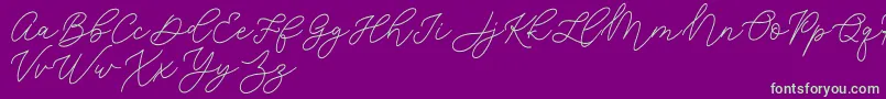 フォントJean Jingga   – 紫の背景に緑のフォント
