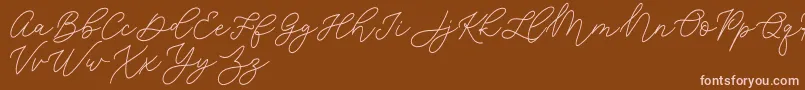 Шрифт Jean Jingga   – розовые шрифты на коричневом фоне